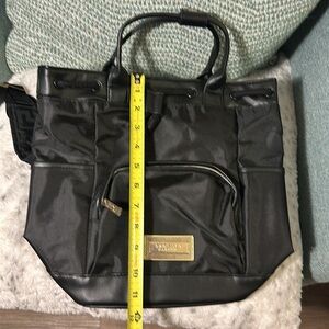 Womens Black Versace perfumes nylon small backpack. Still with seal on nameplate